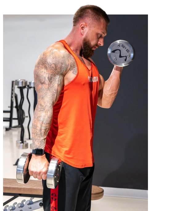 Man focused on lifting weight